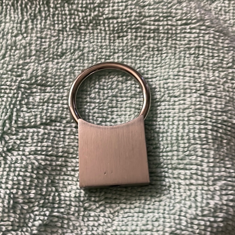 A stainless steel key ring “Dignity Health Northridge Hospital Medical Center”